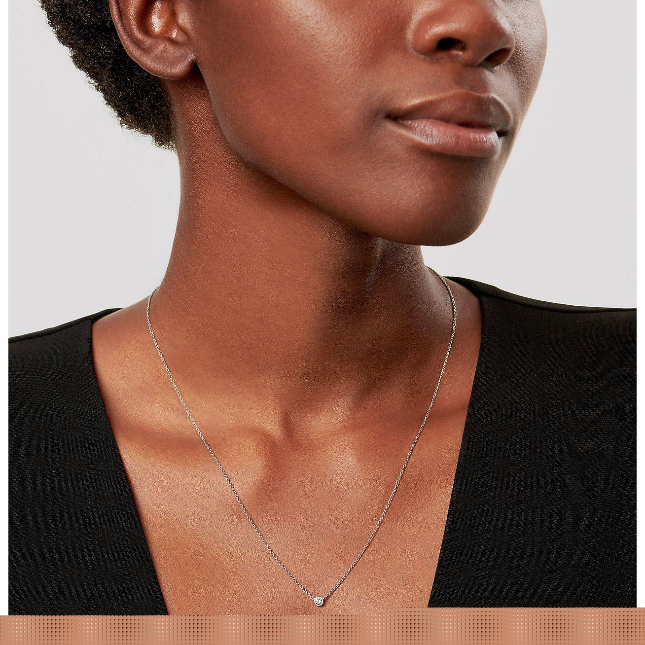 T*f*ny  elsa peretti® diamonds by the yard® single diamond pendant in platinum