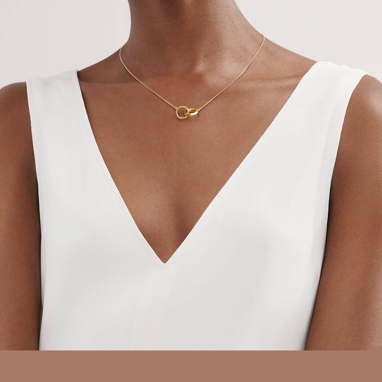 T*f*ny&co.atlas® x closed interlocking pendant in yellow gold 67789202