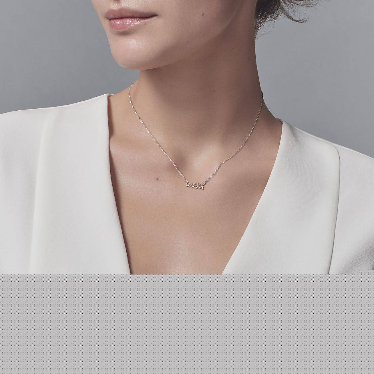 T*f*ny palomas graffiti wish pendant